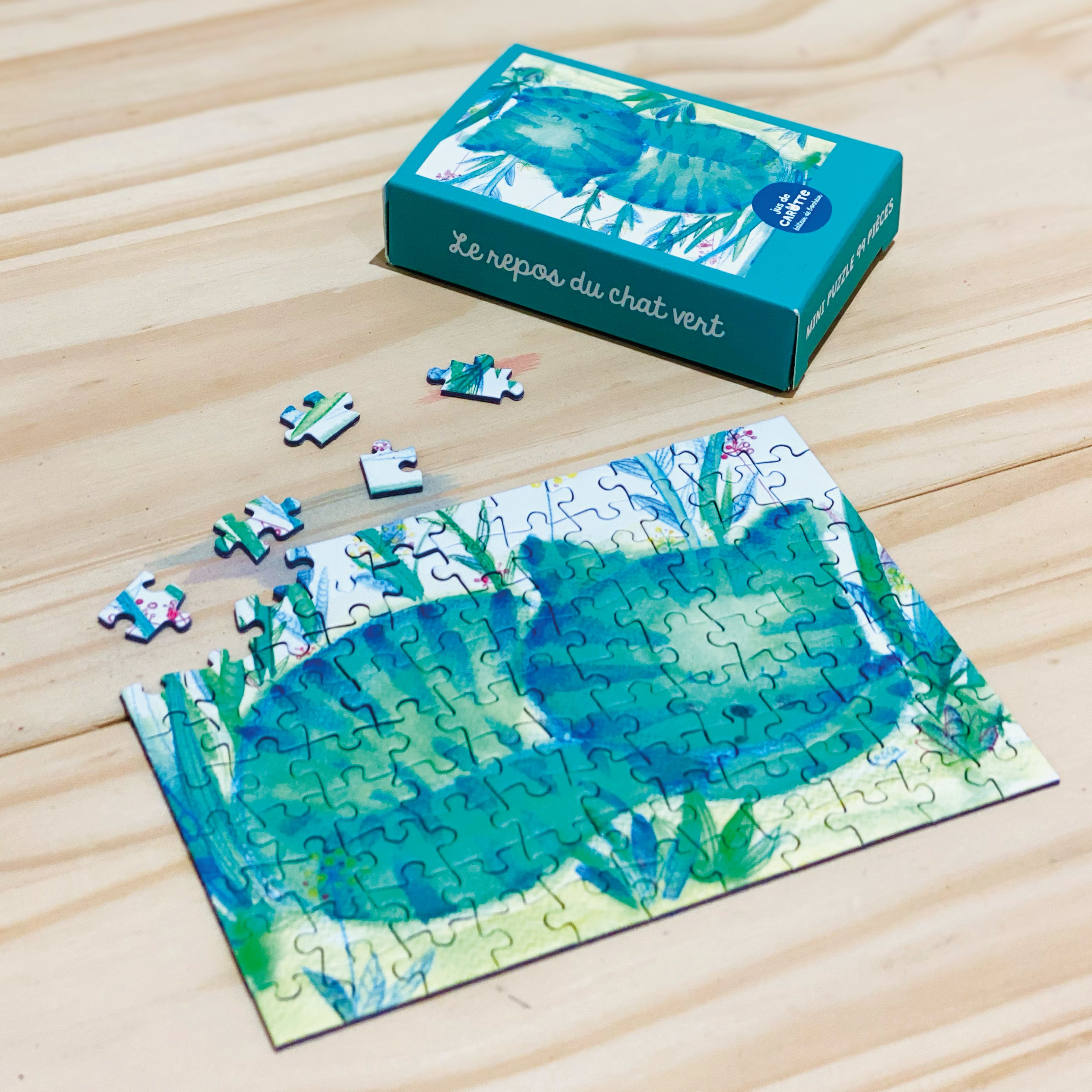 Mini Puzzle 99 pièces Le repos du chat vert