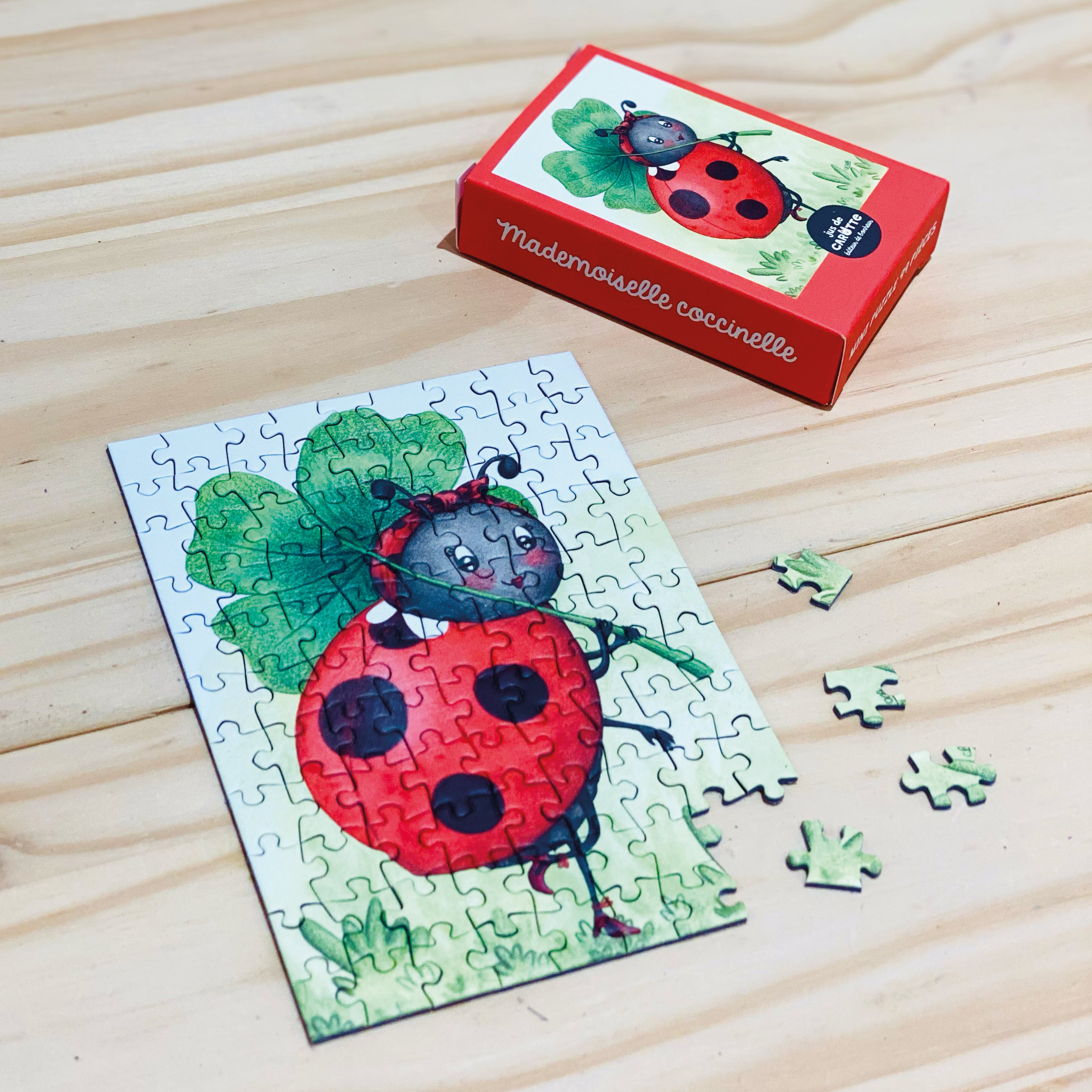 Mini Puzzle 99 pièces Mademoiselle coccinelle